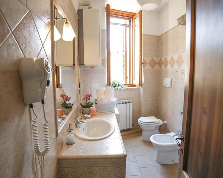 Palazzo Le Muse Apartments Беваня Екстериор снимка