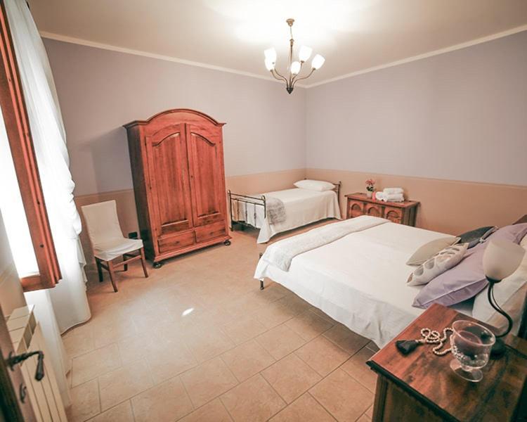 Palazzo Le Muse Apartments Беваня Екстериор снимка